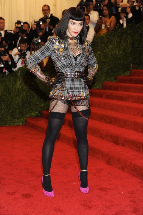 Madge knows it's totally punk to keep your badass lingerie on full display.
