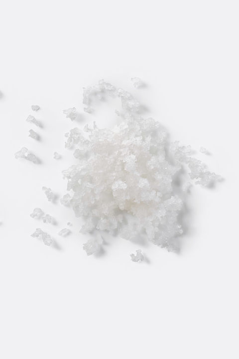 Don't make a daily habit of it (it can be drying to the skin), but you can buff the skin and soak up oil by creating a smooth paste of salt and water and applying it to the T-zone. Leave it on for just a few minutes, wash it off with warm water, and voilà. Grease-free!