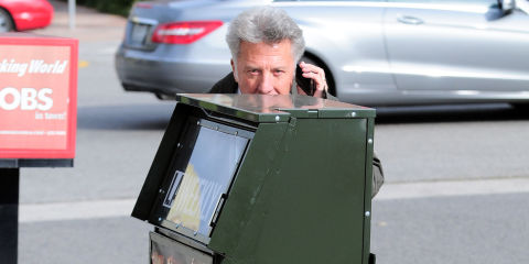 If Alec Baldwin is the Anger archetype of celebrity-paparazzi relations, Dustin Hoffman must be Joy. There's tons of evidence of him goofing around with those who make their living trailing him, but our favorite has to be the Hide and Seek series, in which Hoffman crouches behind various objects, such as trees and newspaper vending machines. 