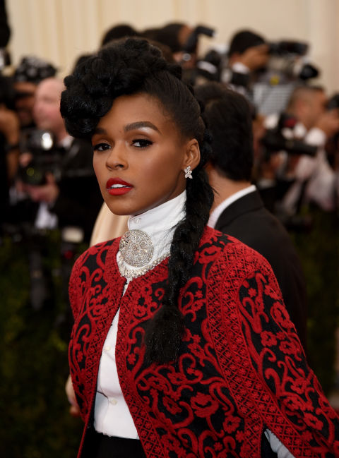 The bigger and bolder, the better, says the wisdom of Janelle Monáe. Here&nbsp;she piles a tilted&nbsp;braid atop her head and lets the rest hang down on her shoulders in a side braid.&nbsp;